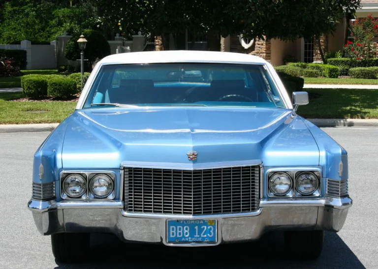 Front view of a light blue 1970 Cadillac Coupe de Ville
