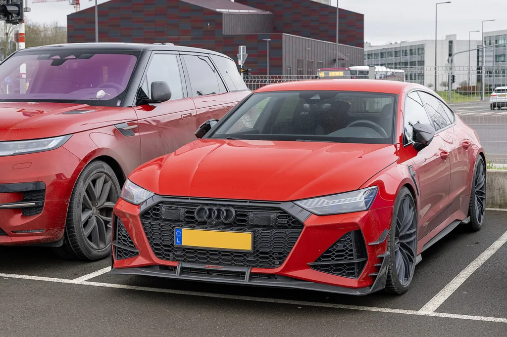 Red Audi ABT RS7-R Sportback parked outside