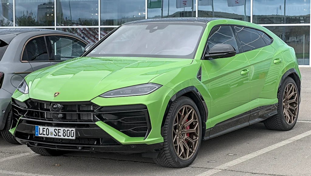 Bright green Lamborghini Urus SE SUV, front three-quarter view